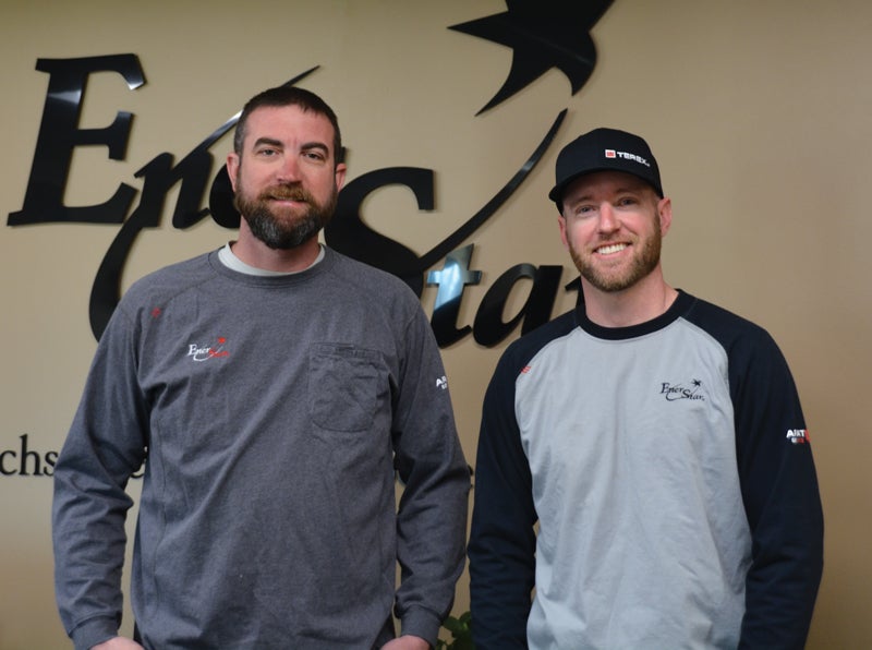 Russ Camp (left) and Ryan Haddix lead line crews with a dedication to service.